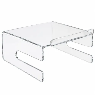 Transparante monitorstandaard met toetsenbordhouder van 6 mm glashelder acrylaat, schuin van voren gezien.